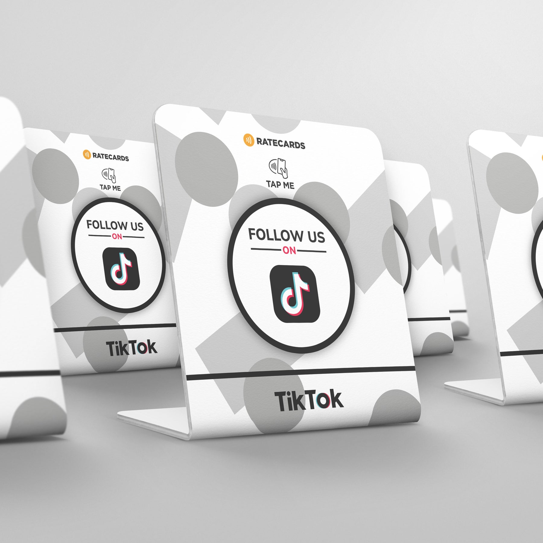 Customer tapping a RATECARDS TikTok stand to follow on TikTok