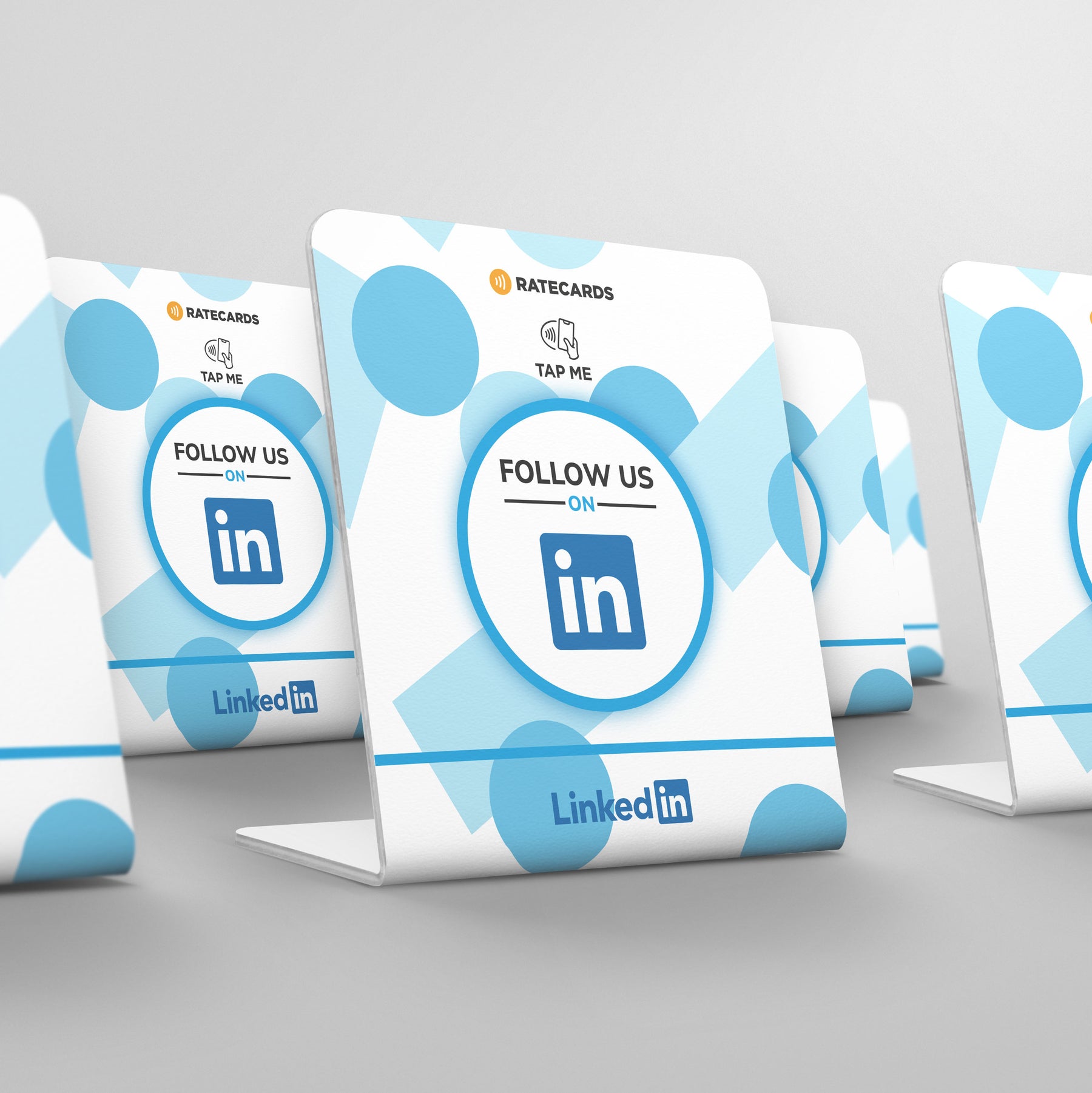 Customer tapping a RATECARDS LinkedIn stand to connect instantly